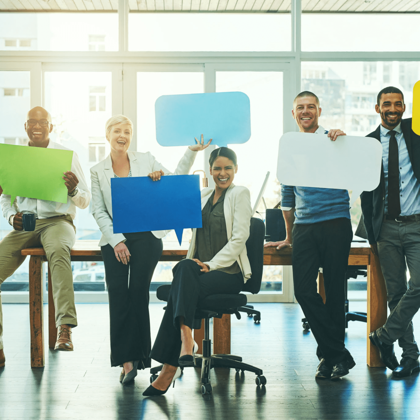 Group of professionals with speech balloons